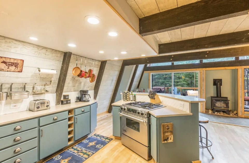 Recently remodeled modern kitchen!  Open concept dining area off kitchen along with gas fireplace!