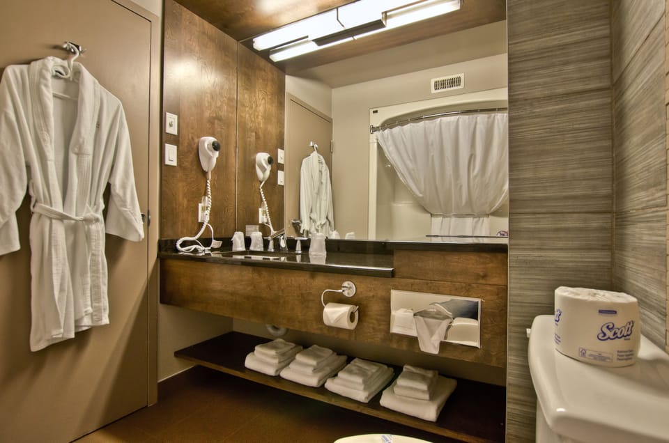 Superior Room, 2 Queen Beds | Bathroom | Combined shower/tub, hair dryer, towels