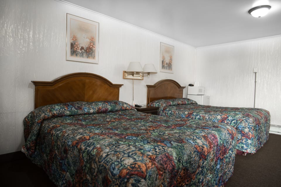 Room, 2 Queen Beds | Iron/ironing board, free WiFi, bed sheets