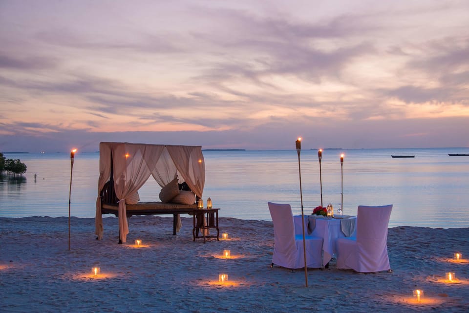 On the beach, white sand, free beach cabanas, sun loungers