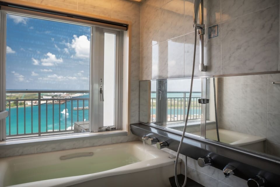 Suite Non Smoking | Bathroom | Combined shower/tub, deep soaking tub, free toiletries, hair dryer