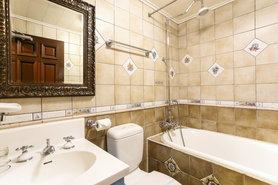Mountain View Double Room | Bathroom | Combined shower/tub, free toiletries, hair dryer, slippers