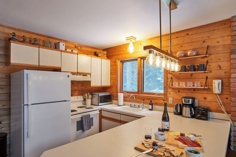 We kept the 80's alive in this full-size kitchen equipped w/ everything you need