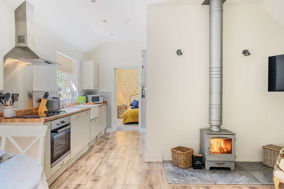 Stable Cottage: The wood burning stove is ideal for cosy days in
