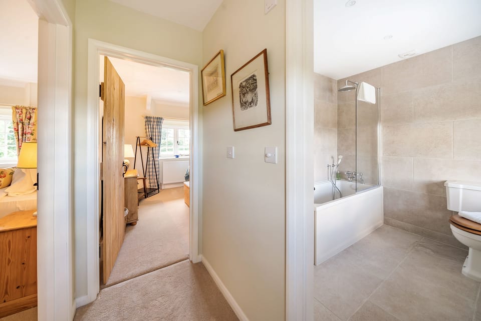 Crumpet Cottage, Chebbard: View of the twin bedroom and family bathroom