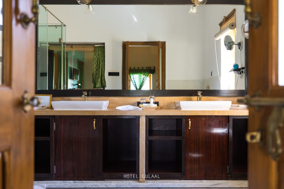 Luxury Suite, 1 Bedroom | Bathroom | Shower, free toiletries, hair dryer, bathrobes