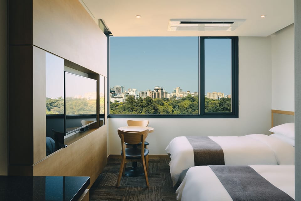 Premium bedding, individually furnished, desk, laptop workspace