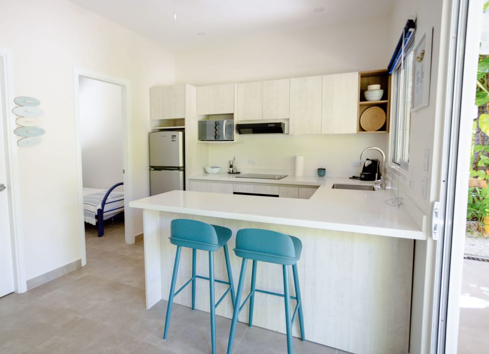Family Bungalow, Ensuite, Garden View | Private kitchen | Espresso maker, coffee/tea maker, cleaning supplies