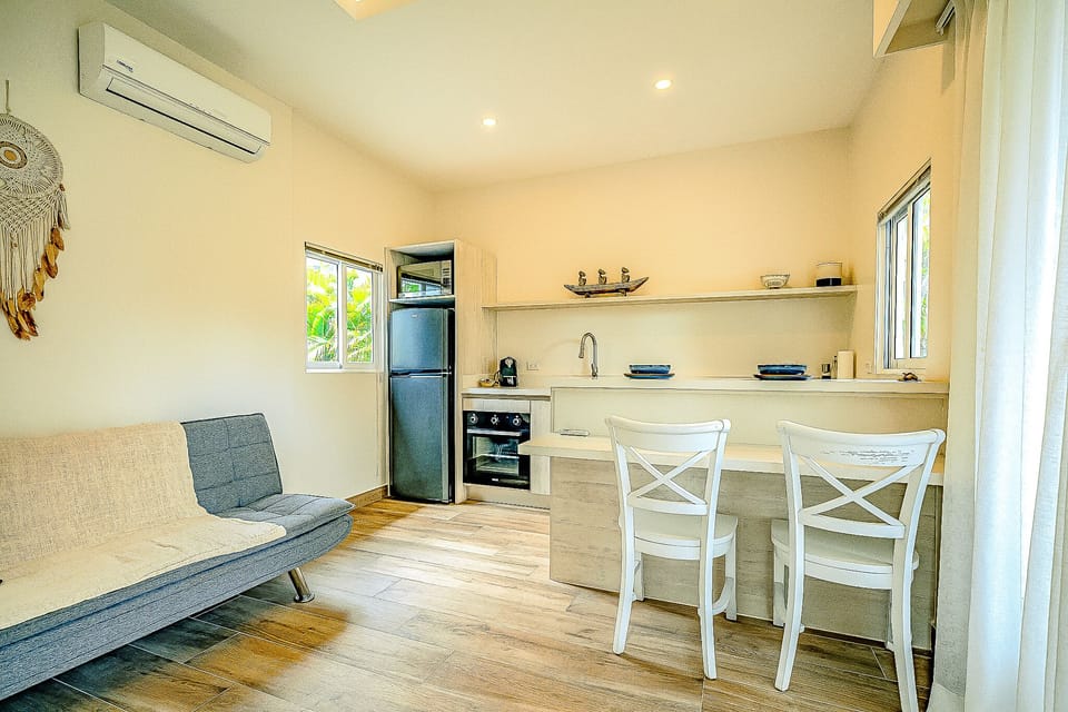 Signature Bungalow, Ensuite, Pool View | Private kitchen | Espresso maker, coffee/tea maker, cleaning supplies