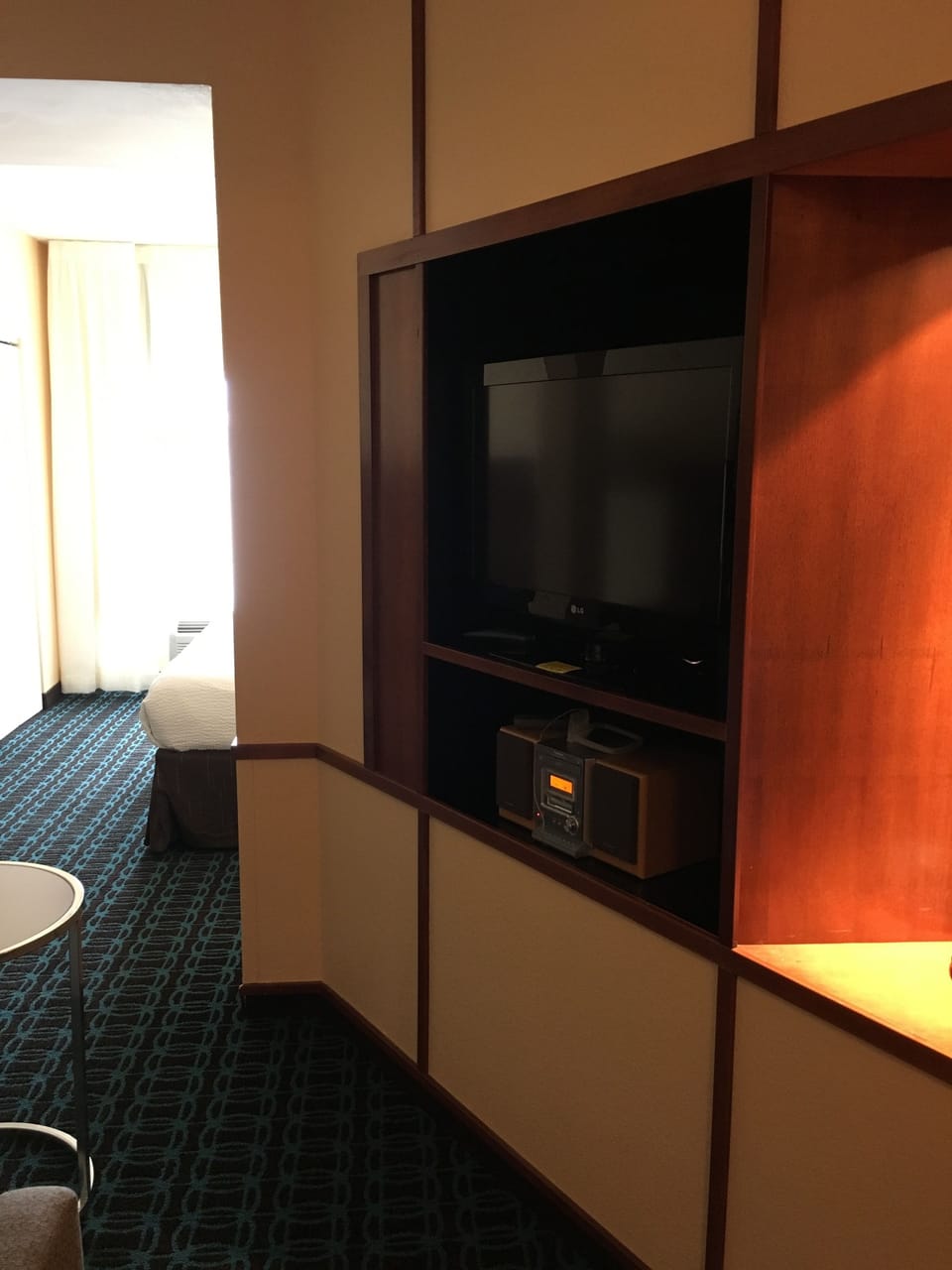 Desk, laptop workspace, blackout drapes, iron/ironing board