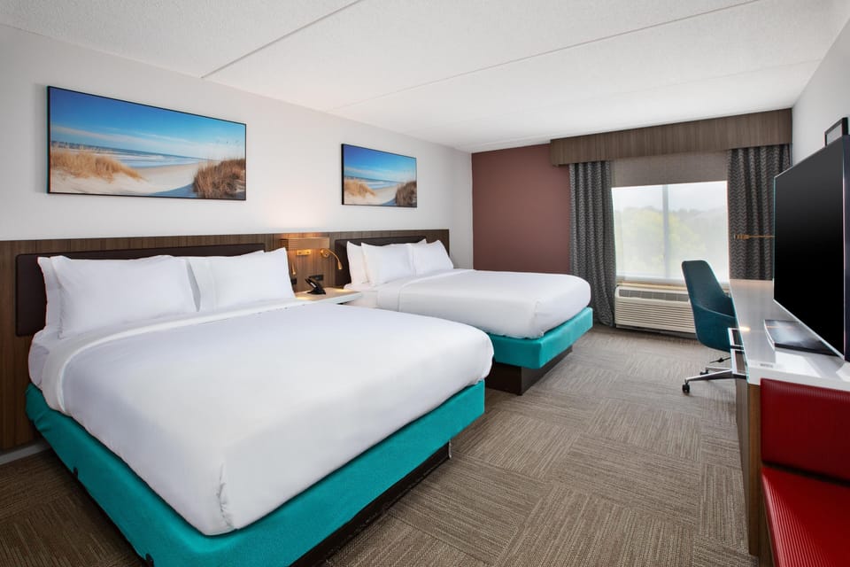 Room, 2 Queen Beds, Non Smoking | Pillowtop beds, in-room safe, individually decorated