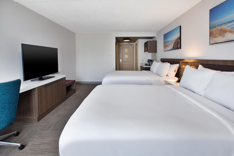 Room, 2 Queen Beds, Non Smoking | Pillowtop beds, in-room safe, individually decorated