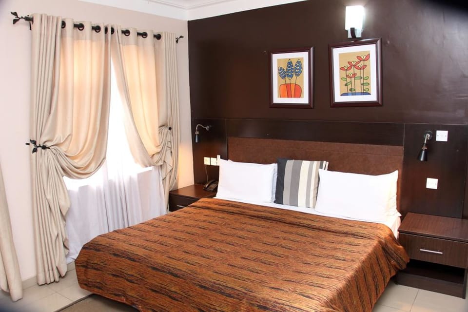 Standard Room | 1 bedroom, in-room safe, individually decorated, individually furnished