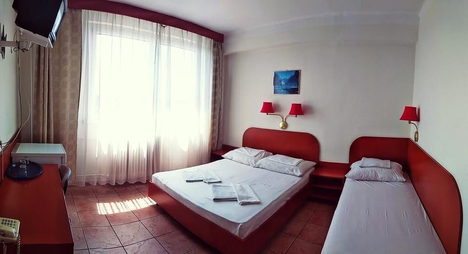 Double Room | Desk, blackout drapes, free WiFi, bed sheets