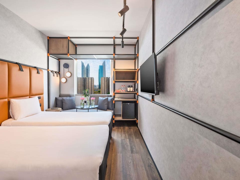 Standard Room, 2 Twin Beds | Minibar, desk, soundproofing, iron/ironing board
