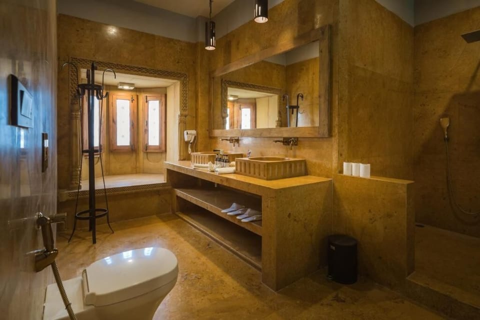 Shower, designer toiletries, hair dryer, bathrobes