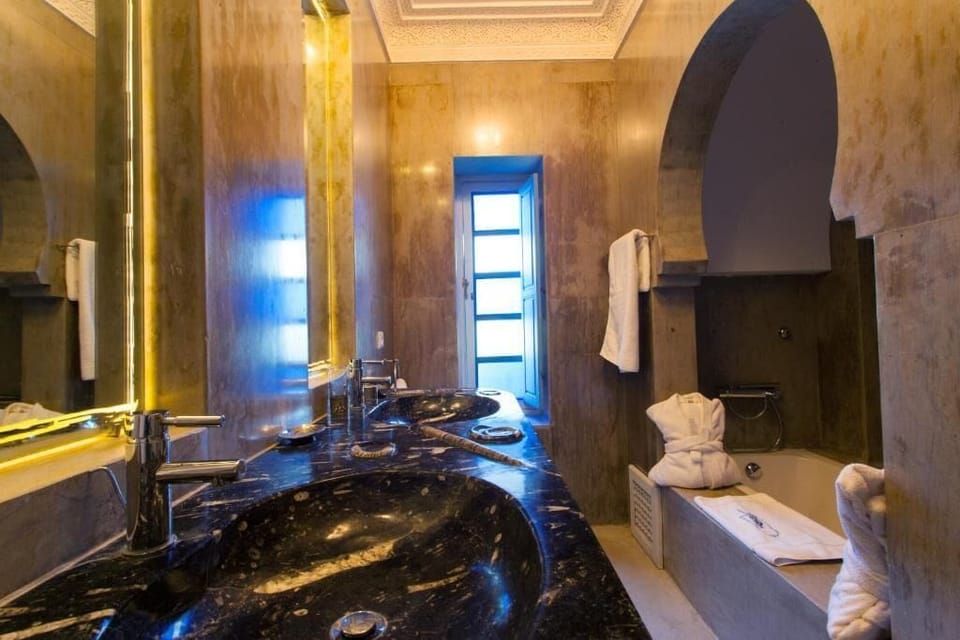 Deep soaking tub, bathrobes