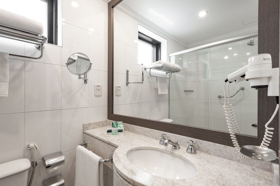 Premium Double Room | Bathroom | Shower, hair dryer, towels, soap