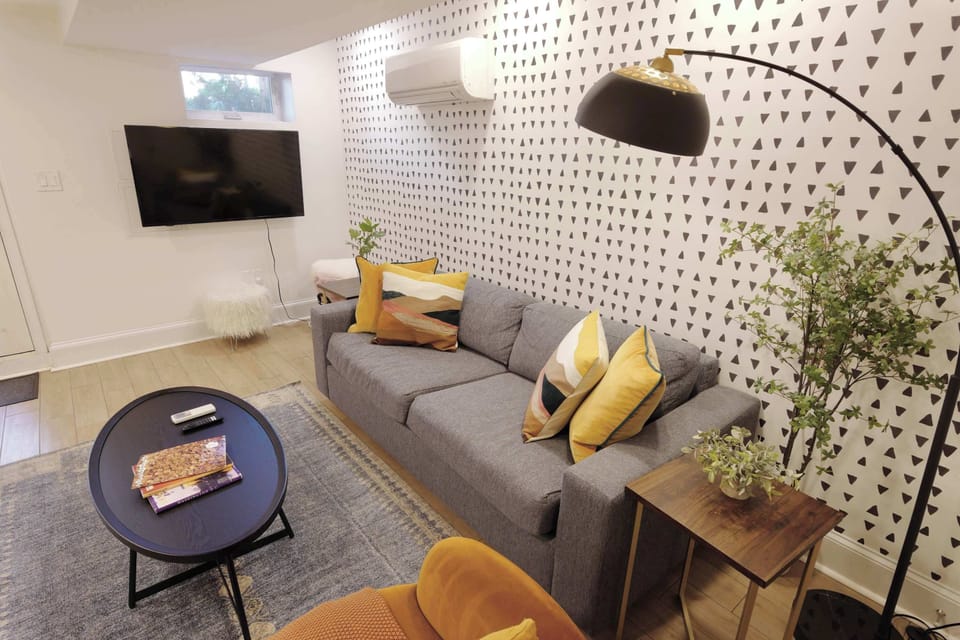 Stream all your favorite shows and movies on the SmartTV featured in the living room