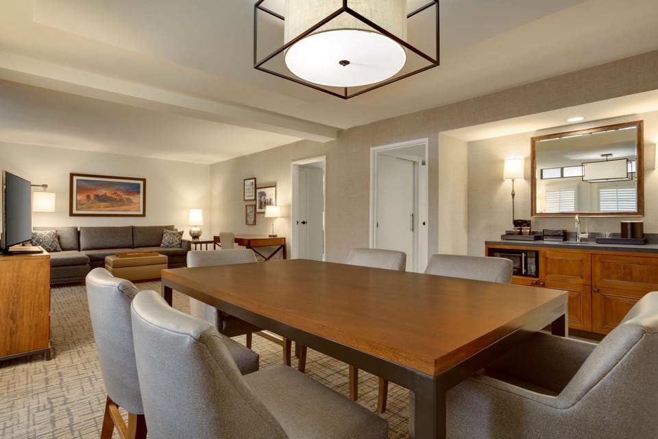 Suite, 2 Bedrooms (1 king and 2 double beds) | Living area | 43-inch flat-screen TV with cable channels, TV, pay movies