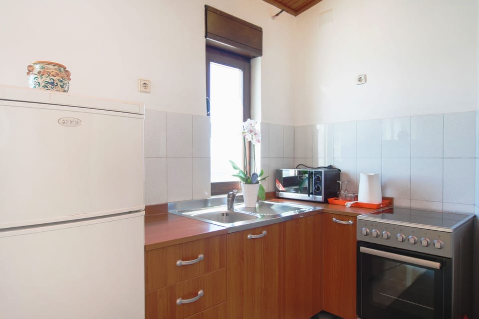 Panoramic Apartment, Terrace, Sea View | Private kitchen | Fridge, coffee/tea maker, electric kettle
