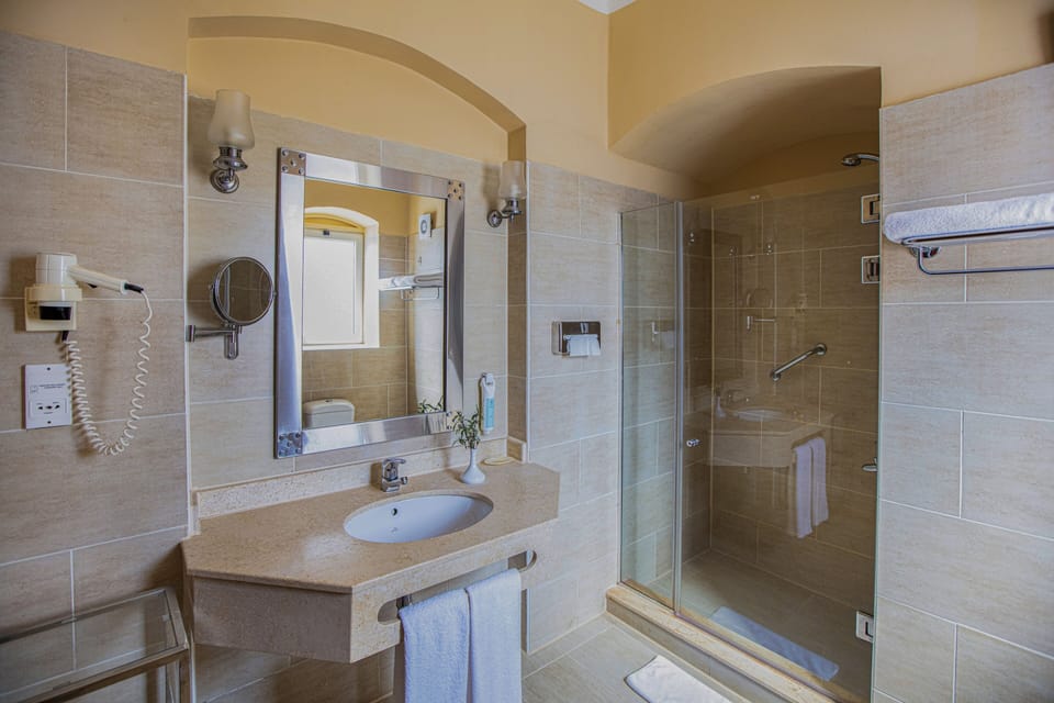 Shower, free toiletries, hair dryer, bathrobes