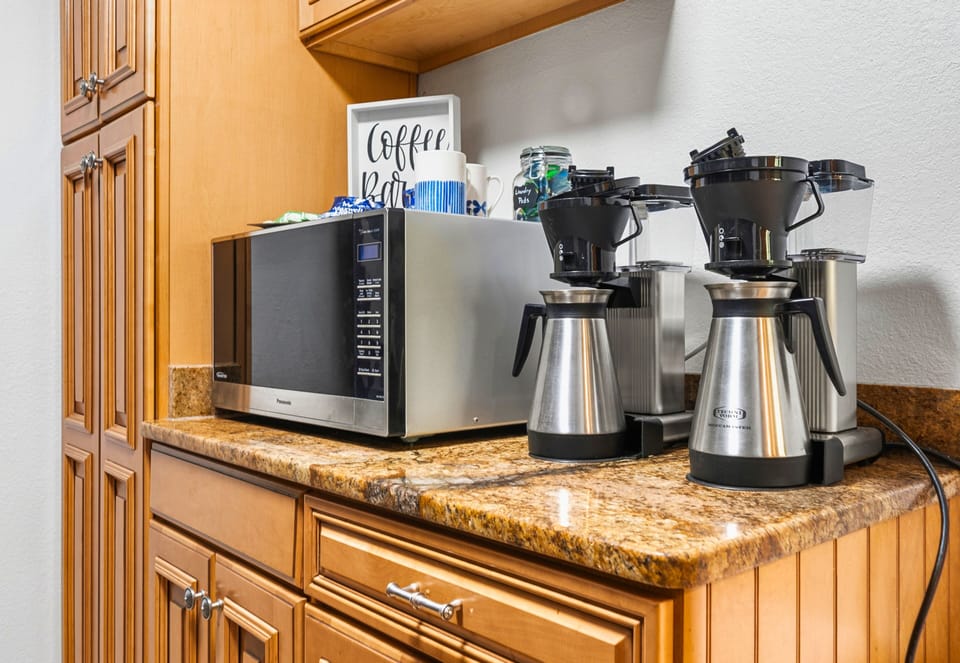 A convenient coffee and snack area makes mornings easier before heading out to enjoy the lake and outdoor spaces.