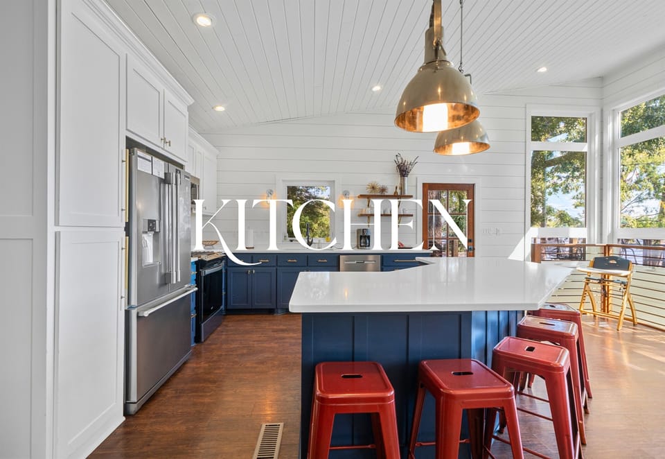 The kitchen: bold blue cabinets, modern appliances, and plenty of space to create meals.