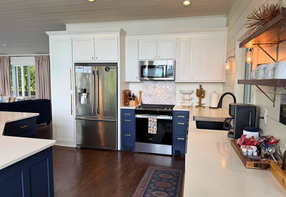 Appreciate the clean lines and modern touches of the kitchen, designed with both style and functionality in mind.