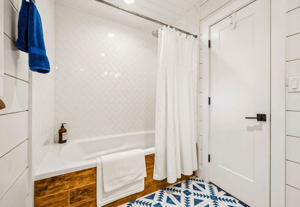 Refresh in this well-designed bathroom where simple, modern touches and a clean layout make getting ready feel easy and comfortable.