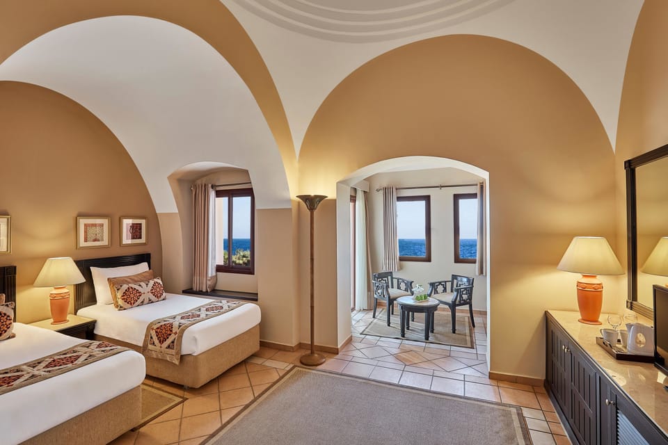 Deluxe Room, Sea View (Queen or Twin) | 1 bedroom, in-room safe, individually decorated, individually furnished