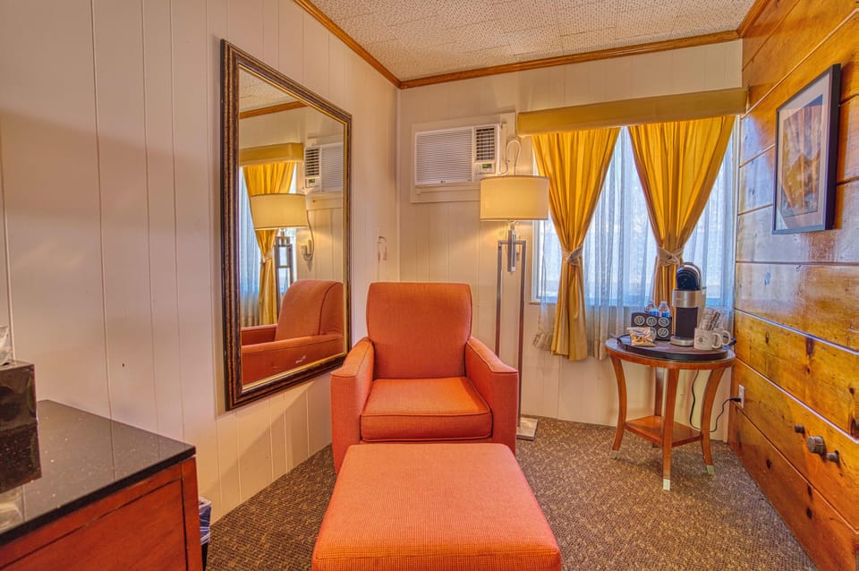 Superior Room, 1 King Bed | Living area | 55-inch TV with satellite channels