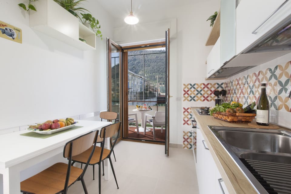 Apartment, 2 Bedrooms, Smoking, Balcony | Private kitchen | Microwave, dishwasher, coffee/tea maker, cookware/dishes/utensils