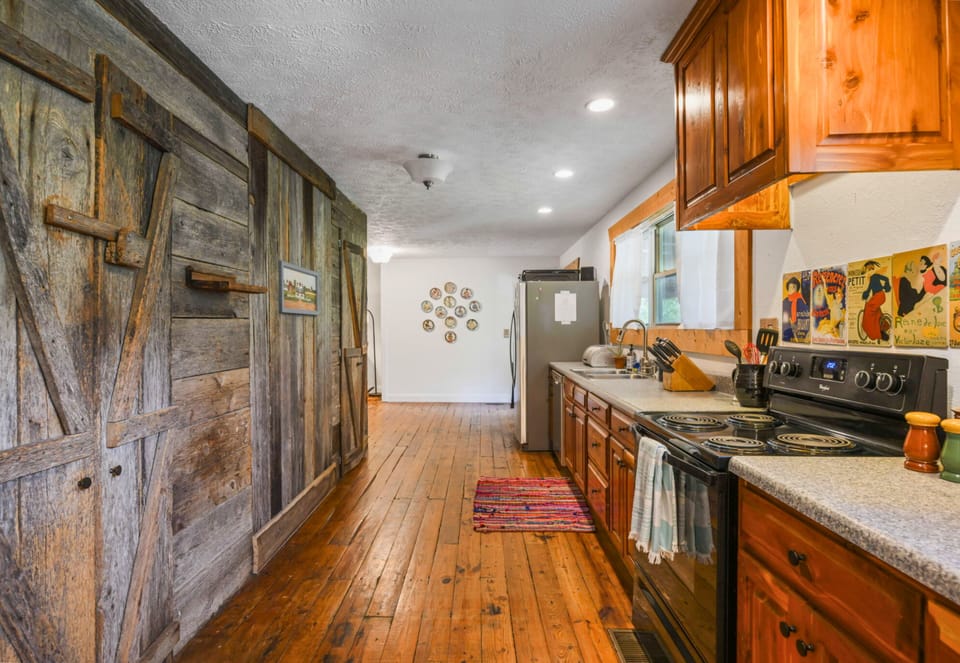 The Kitchen is Wide Open and has a lot of Counter Space, Great for Cooking 