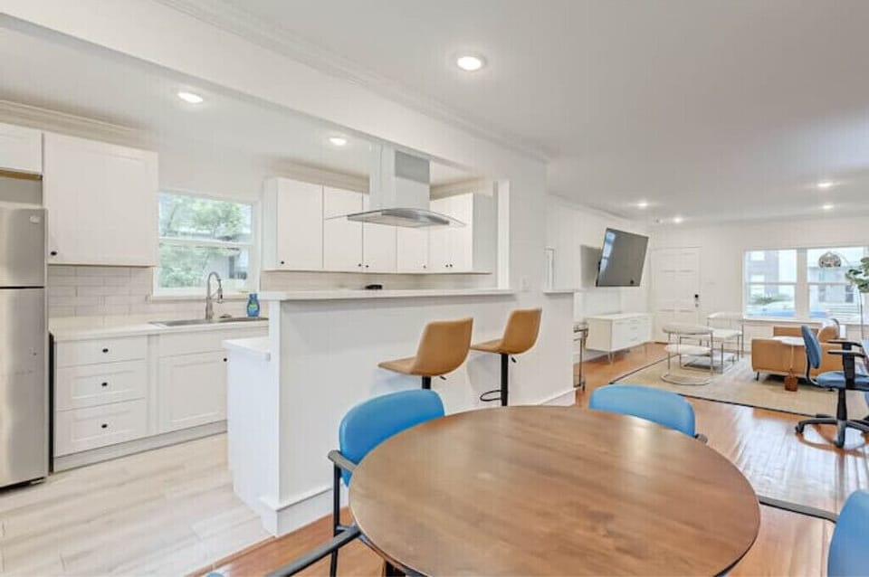 Dining area and kitchen on the left. 