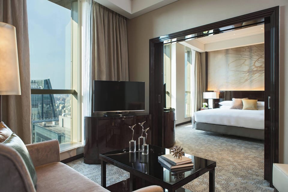 Club Suite, 1 Bedroom | Living area | 40-inch LCD TV with satellite channels, TV