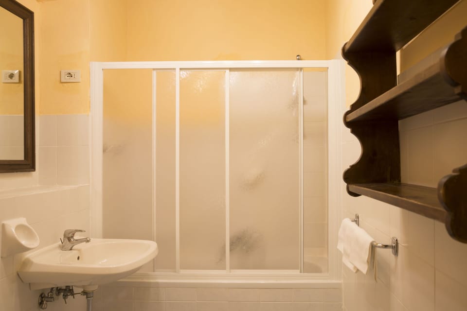 Shower, eco-friendly toiletries, hair dryer, bidet