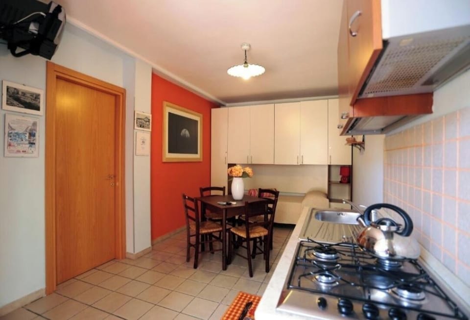 Triple Room, 1 Bedroom | Private kitchen | Full-size fridge, coffee/tea maker, electric kettle, paper towels