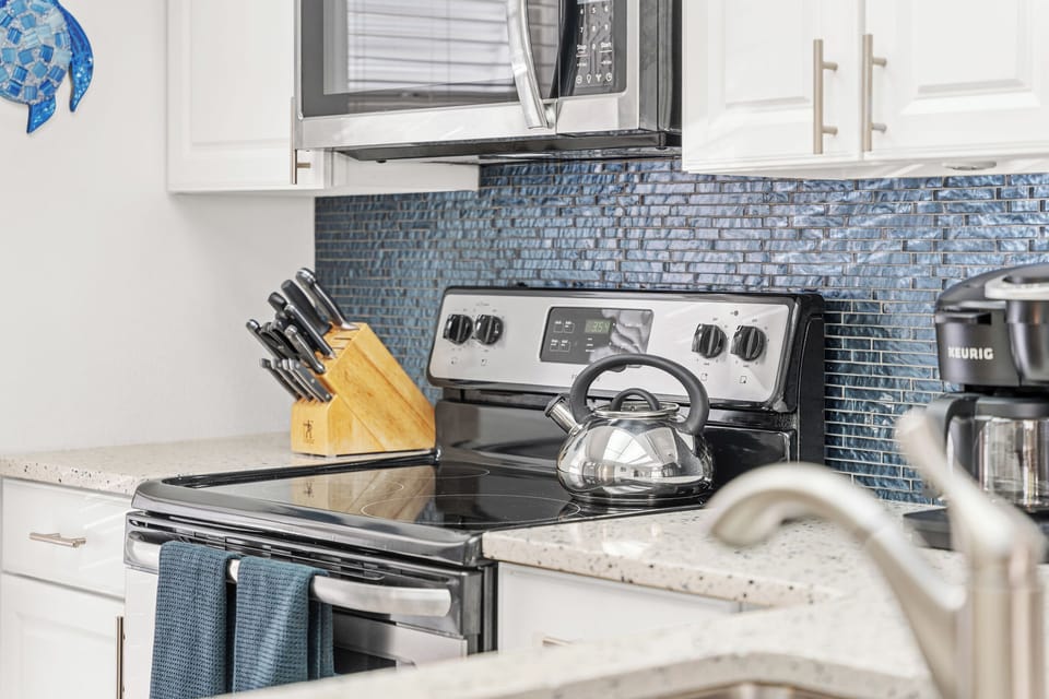This fully equipped kitchen is perfect for preparing memorable meals with family and friends.