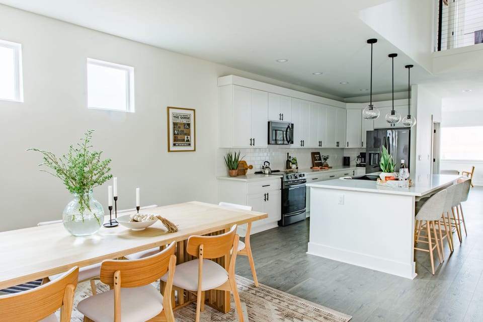 Open dining and kitchen area with plenty of seating.