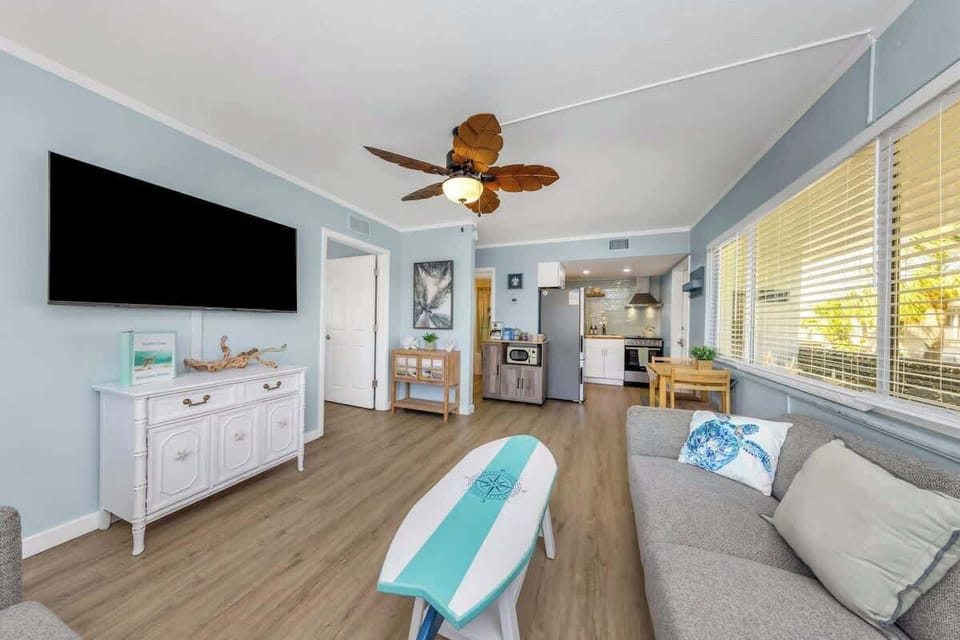 Very open layout, dining table flips up on boths sides and we provide two folding chairs for extra seating