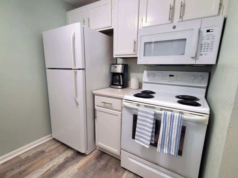 Kitchen, with coffee maker, coffee,  sugar tea and more!