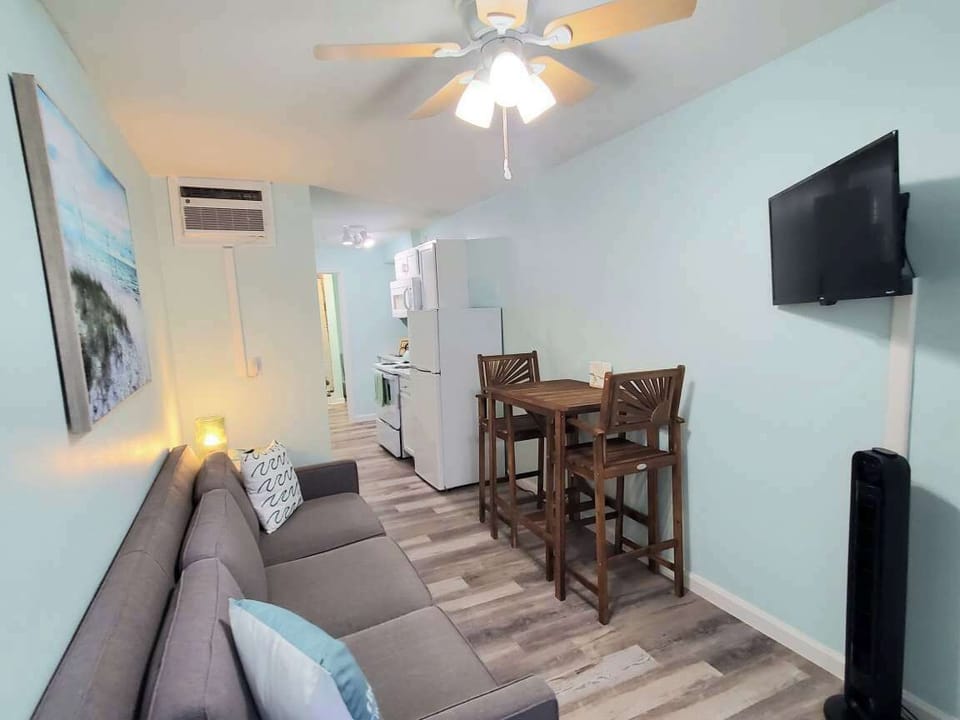TV is on a swivel so you can view it from the table or the couch! Full size kitchen that is fully stocked!