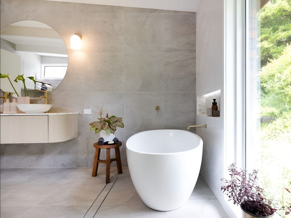 Enjoy a soak in the comfy bath of Bawley Ridge Farmhouse east wing