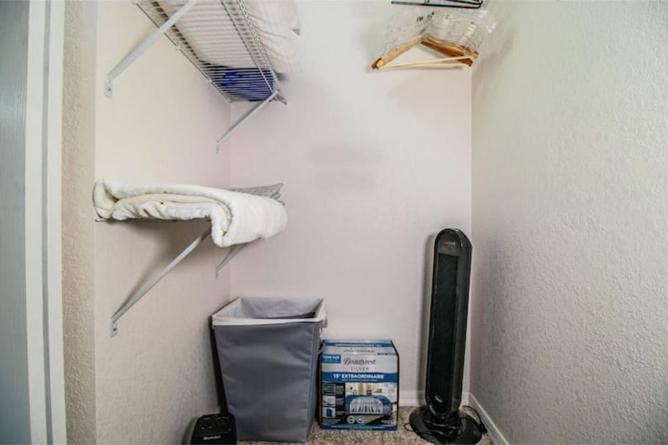 Master Bedroom Closet. Air Mattress. Laundry Basket.