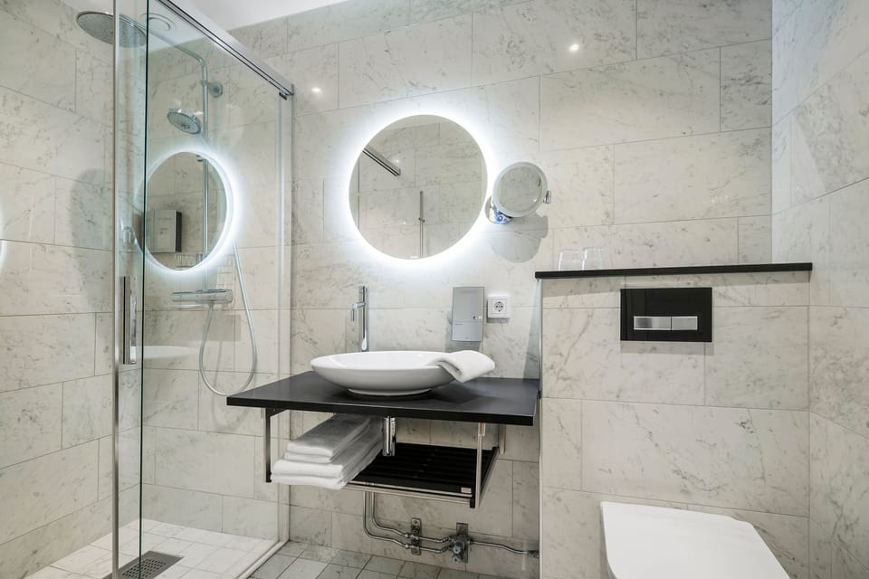 Shower, free toiletries, hair dryer, towels