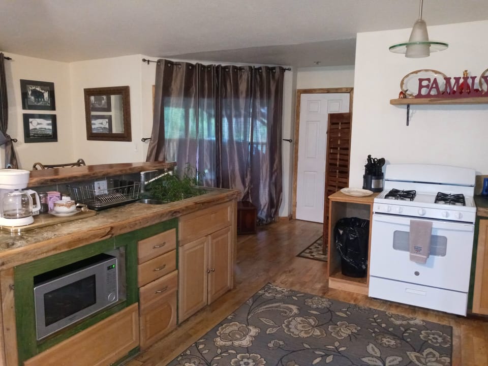 Family House, 2 Bedrooms, Garden View | Private kitchen | Coffee/tea maker, cookware/dishes/utensils, dining tables
