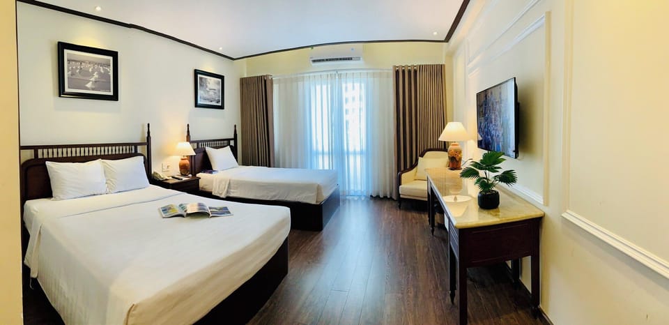 Deluxe Triple Room | Premium bedding, minibar, in-room safe, desk