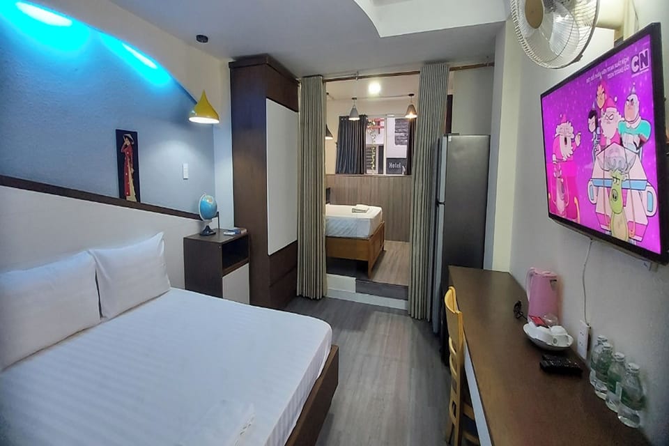 Quadruple Room | Minibar, in-room safe, desk, free WiFi