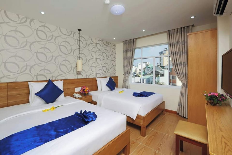 Quadruple Room | Minibar, in-room safe, desk, free WiFi